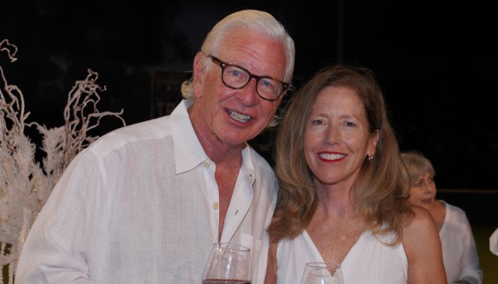 Happy Couple At White Party 1