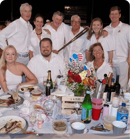 Vero Beach Film Festival attendees enjoying a lively event with food and drinks.