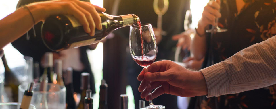 People enjoying wine at the Vero Beach Film Festival event.