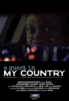 Close-up of a person's face at the Vero Beach Film Festival screening.